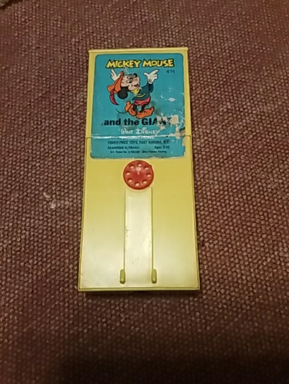 Vintage Disney Yellow Mickey Mouse Wind-Up Game with Red Dial and Blue Label